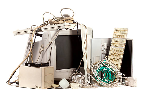 Pile of used, obsolete electronics. E-waste is becoming a major problem worldwide.
